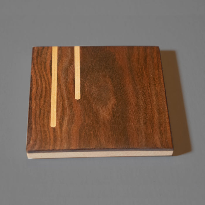 Coaster set of four of Chechen wood with Maple inlay