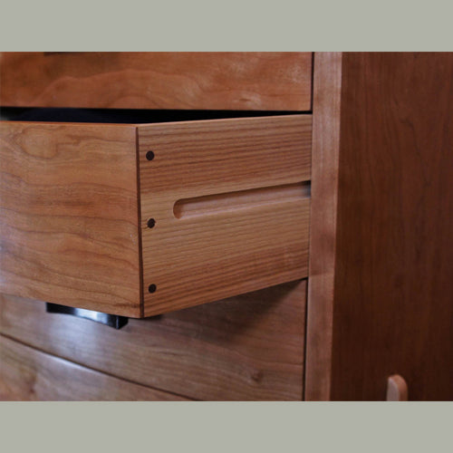 Drawer detail of bowfront cherry dresser with spalted maple and wenge accents