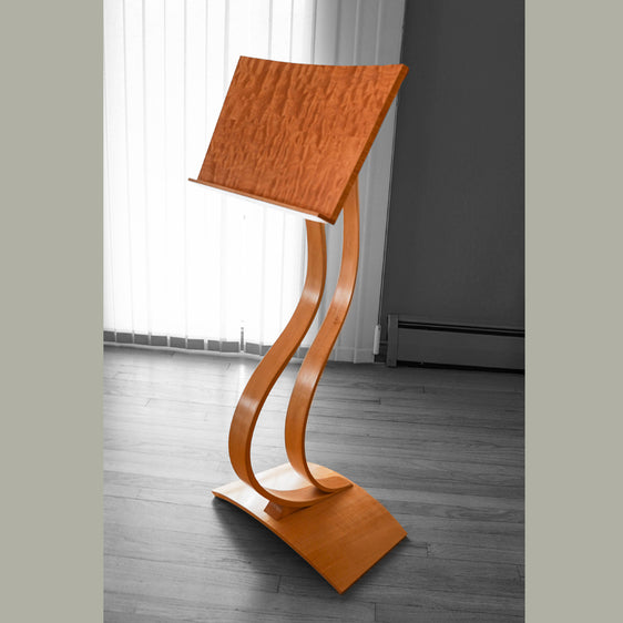 Sculptural music stand of Maple and Quilted Maple.  The stand is fully adjustable