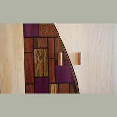 detail of wood mosaic in unique maple wine cabinet