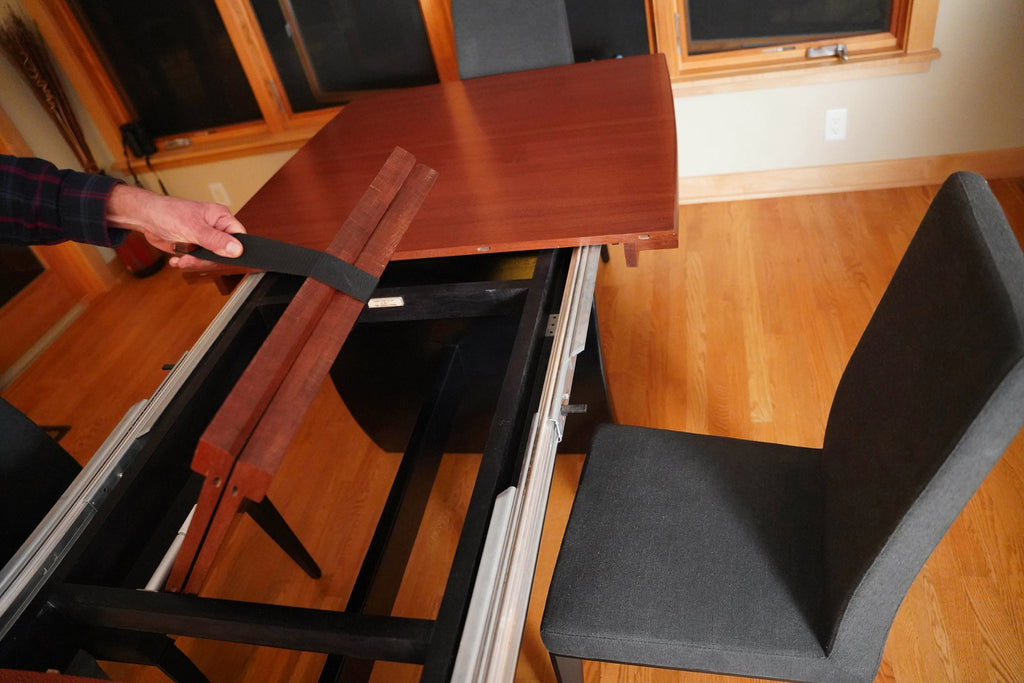 detail of dining room table with hidden extension