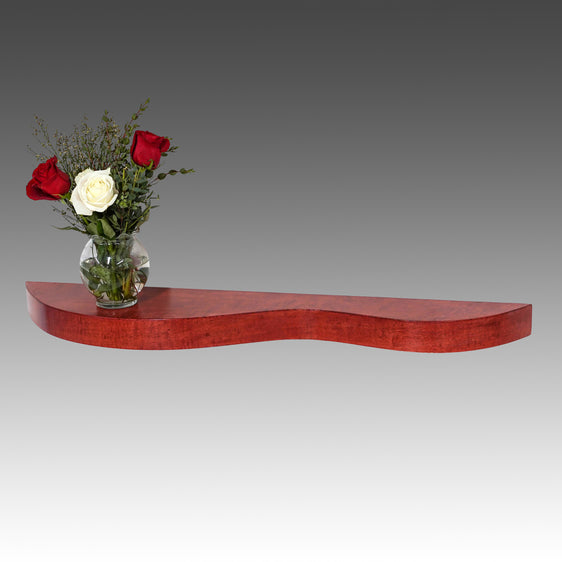 Elegantly curved display shelf or hall shelf of stained maple