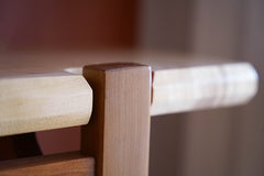 detail of leg of Maple and Cherry  hall table with floating top.