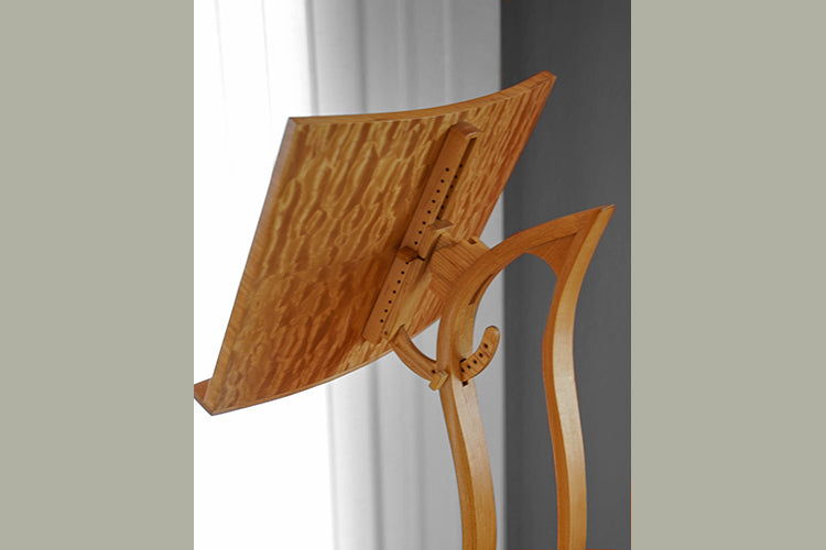 Closeup of  sculptural music stand tilting mechanism
