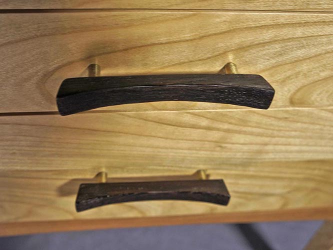Closeup of  Wenge nightstand drawer handles