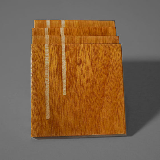 Coaster set of four of Osage Orange wood with Maple inlay