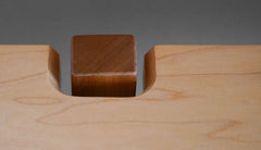 Close-up pf leg on hall table of Maple and Cherry  hall table with floating top