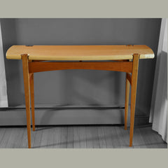 Front view of Maple and Cherry  hall table with floating top.