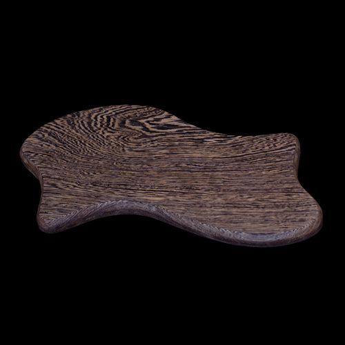 Charcuterie board with delightful curves of bleached Wenge that shows off its gran