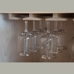 detail of glasses holder in hand crafted maple wine cabinet