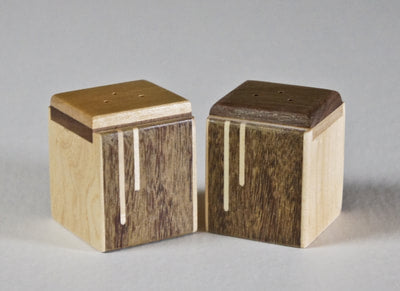 Modern salt and pepper shakers of Brazillian coffee wood with a maple inlay,  A great wedding or house gift,