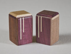 Modern salt and pepper shakers of purplrheart with a maple inlay,  A great wedding or house gift,