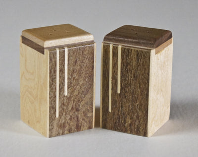 Modern salt and pepper shakers of Brazillian coffee wood with a maple inlay,  A great wedding or house gift,
